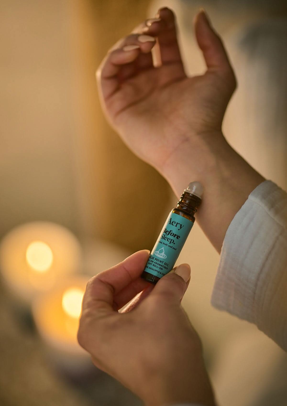 Blue Before Sleep pulse point oil by Aery displayed in hands