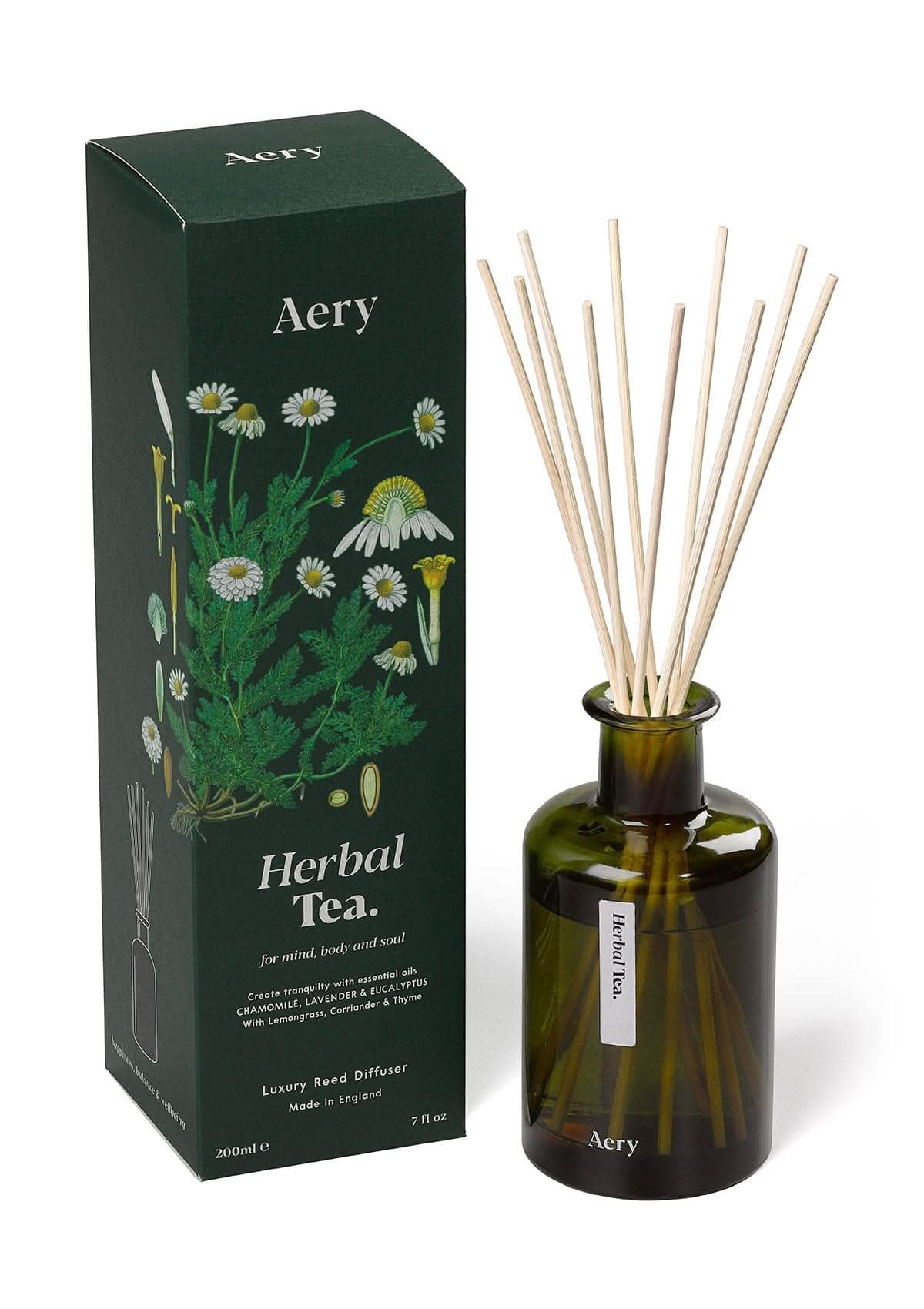 Green Herbal Tea diffuser displayed next to product packaging by Aery on white bacground