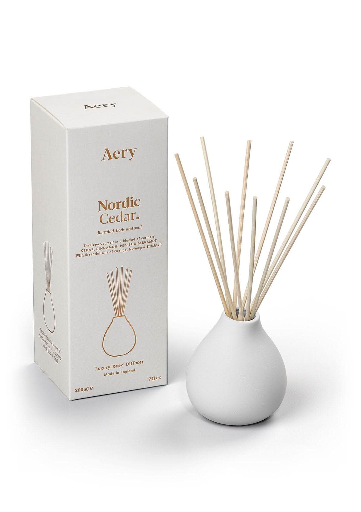 white Nordic Cedar diffuser with product packaging by Aery