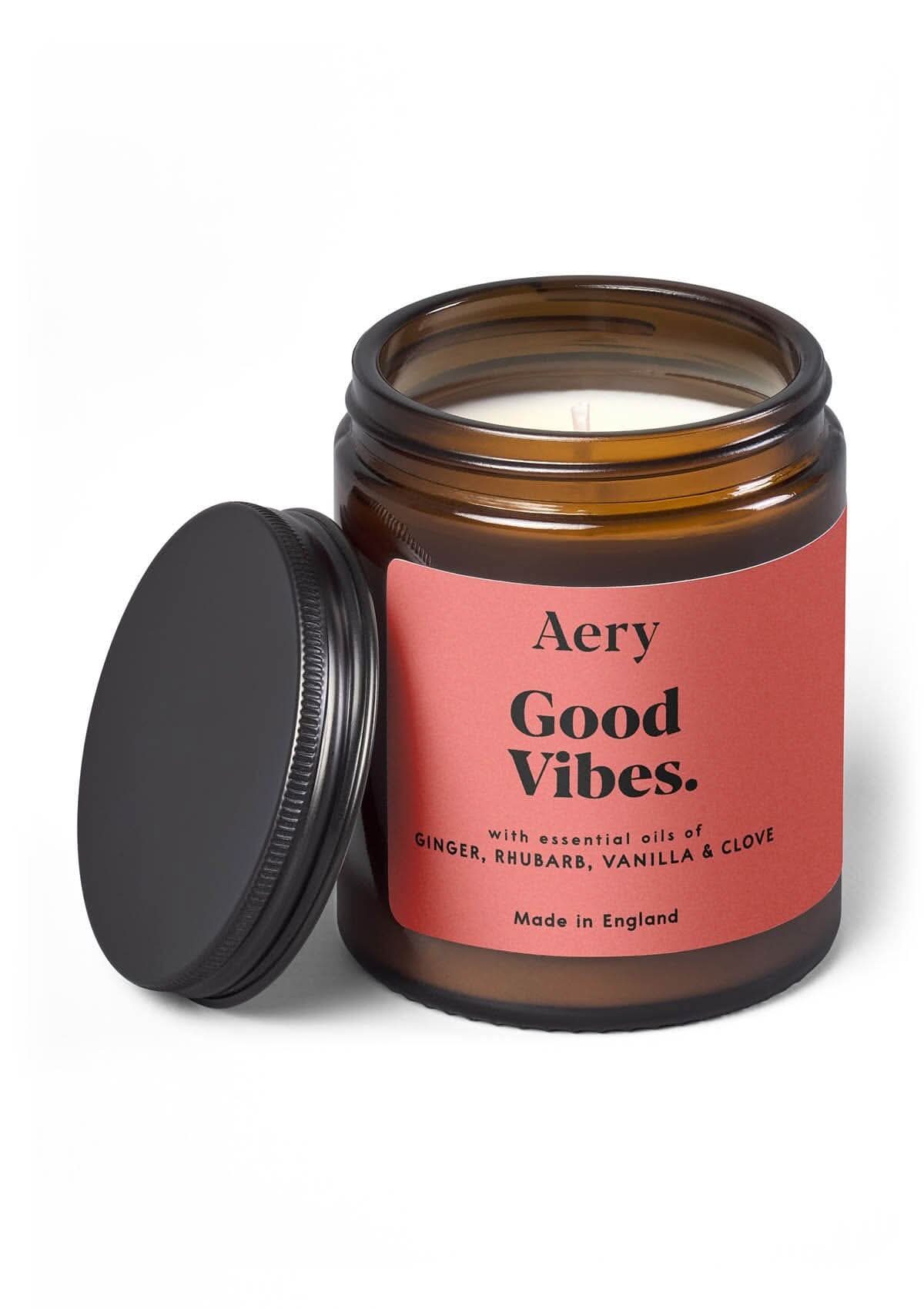 Red Good Vibes jar candle  with lid on white background