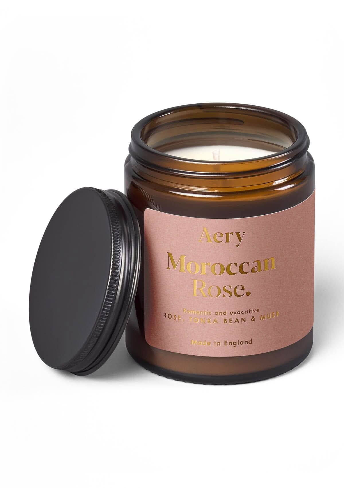 Aubergine Moroccan Rose jar candle by Aery displayed next on white background