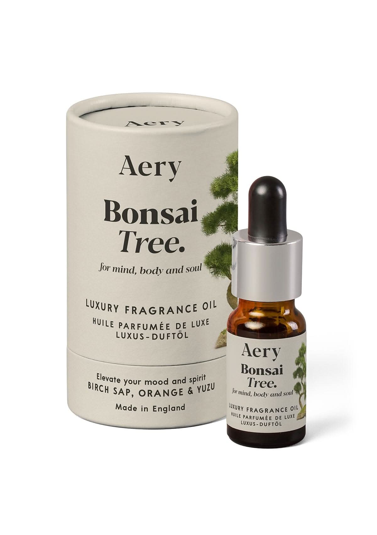 Cream Bonsai Tree fragrance oil displayed next to product packaging by Aery on white background