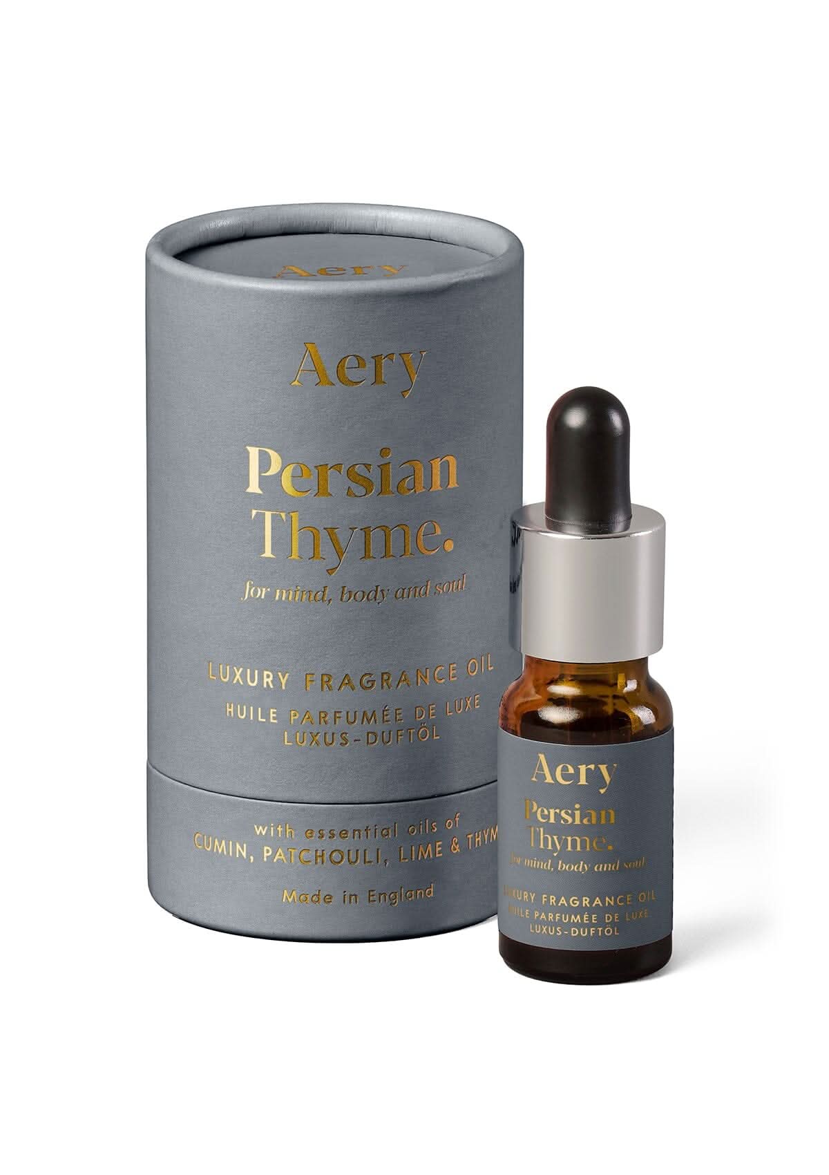Grey Persian Thyme fragrance oil displayed next to product packaging by Aery on white background