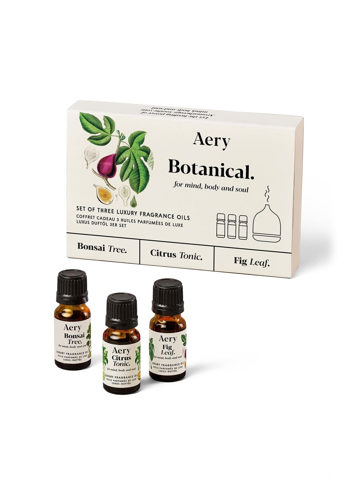 Cream Botanical fragrance oil set of three displayed next to product packaging on white background