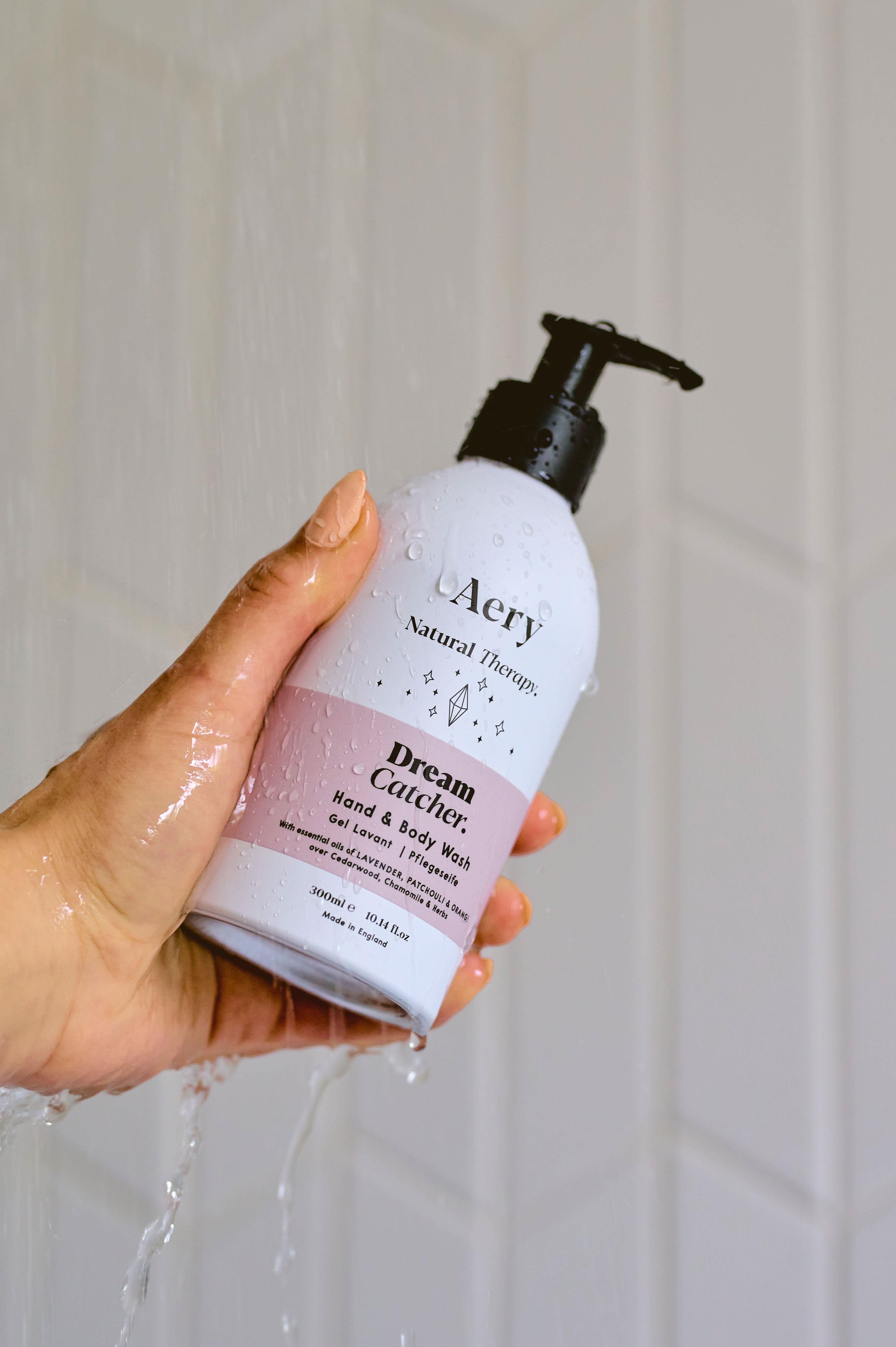 Lilac Dream Catcher hand wash by Aery displayed in hand in shower