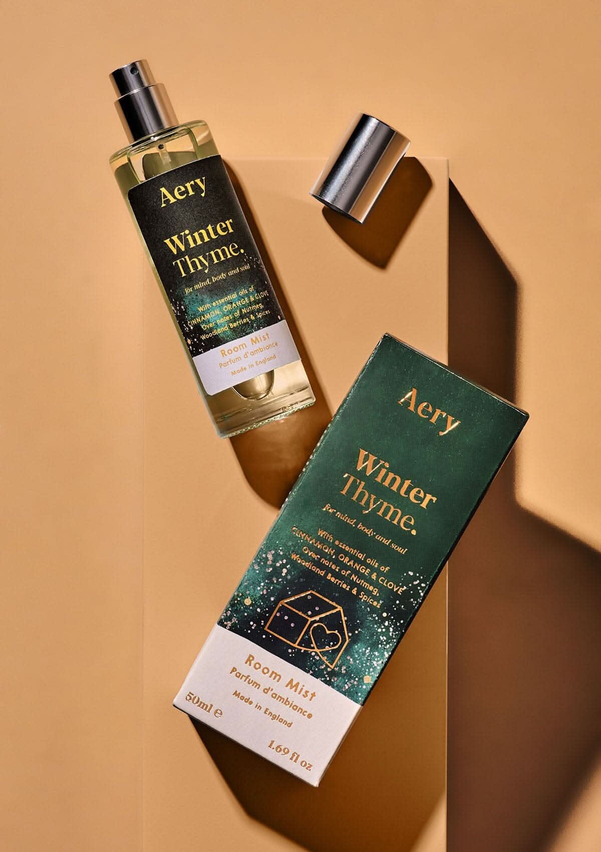 winter thyme room mist displayed next to decorative product packaging
