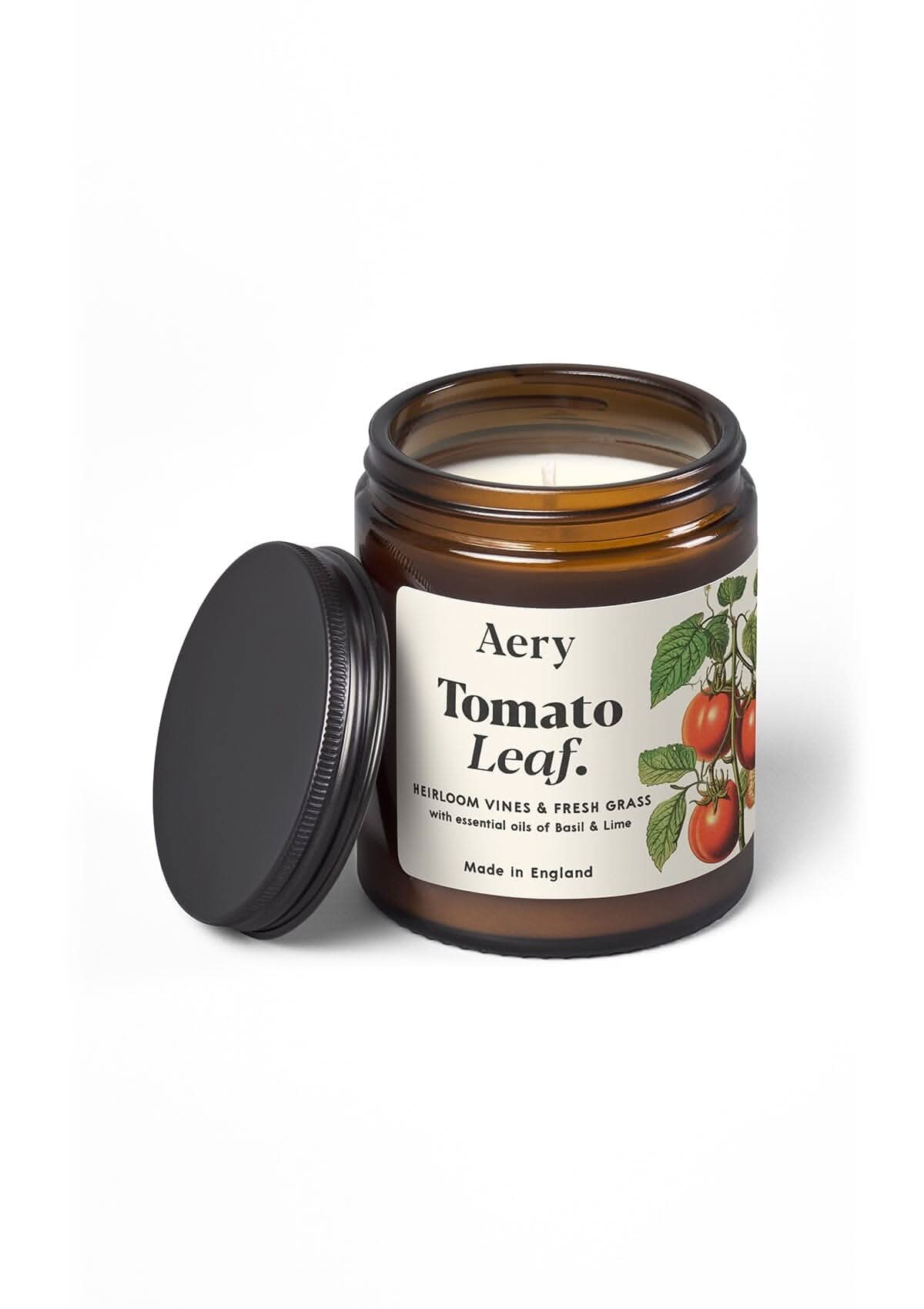 tomato leaf amber glass jar candle with decorative label