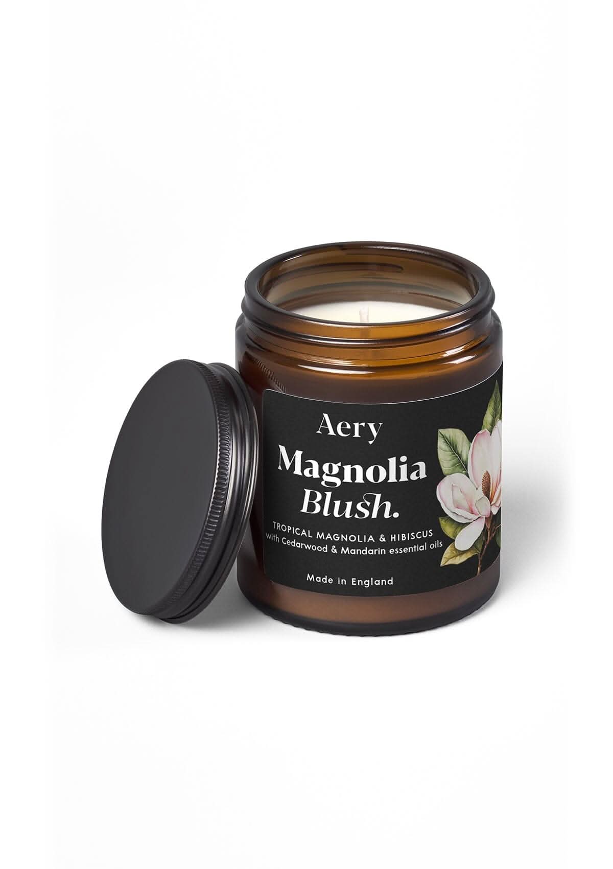 magnolia blush amber jar candle with decorative illustrated label