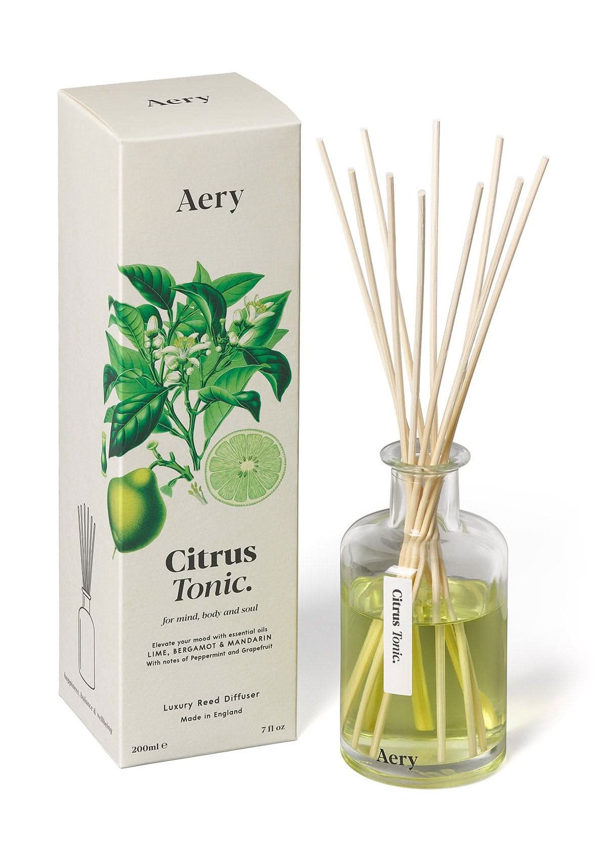 Cream Citrus Tonic diffuser displayed next to product packaging by Aery on white bacground