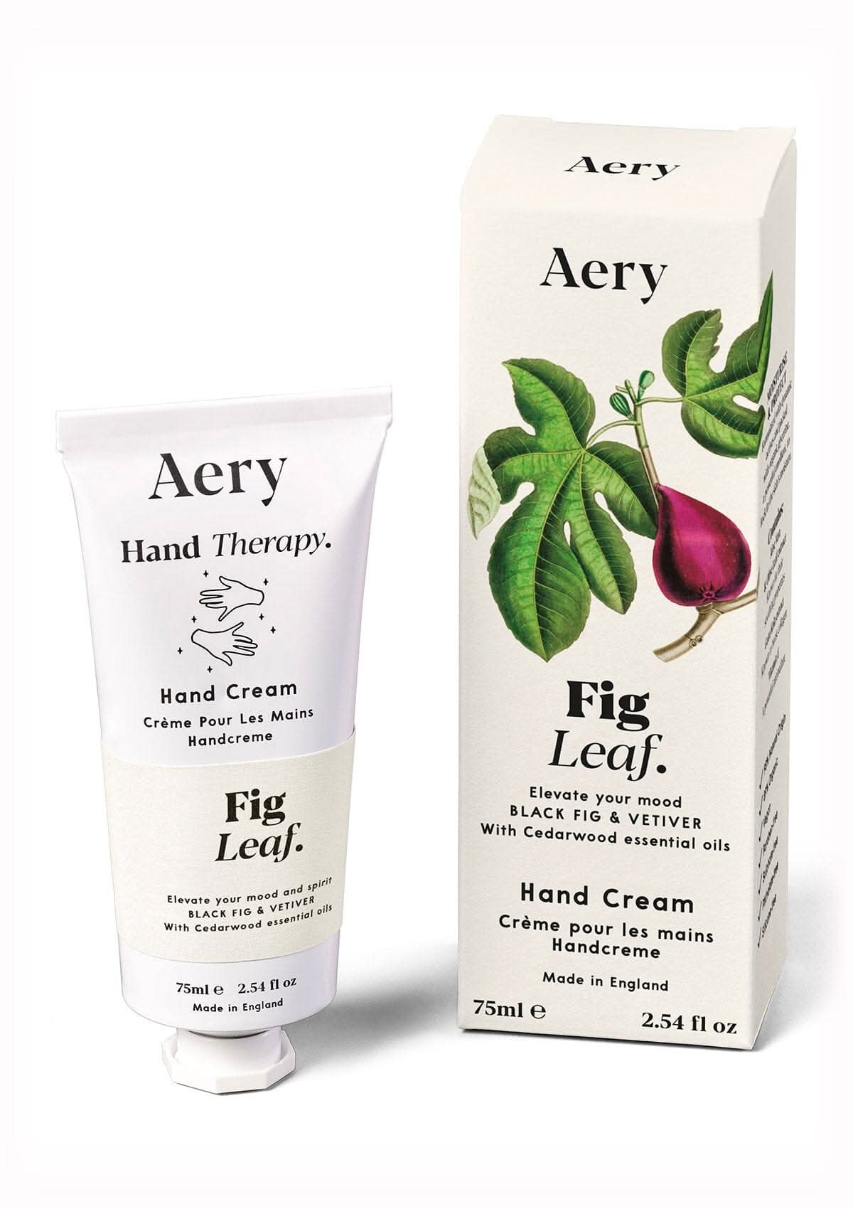 Cream Fig Leaf hand cream displayed next product packaging by Aery on white background